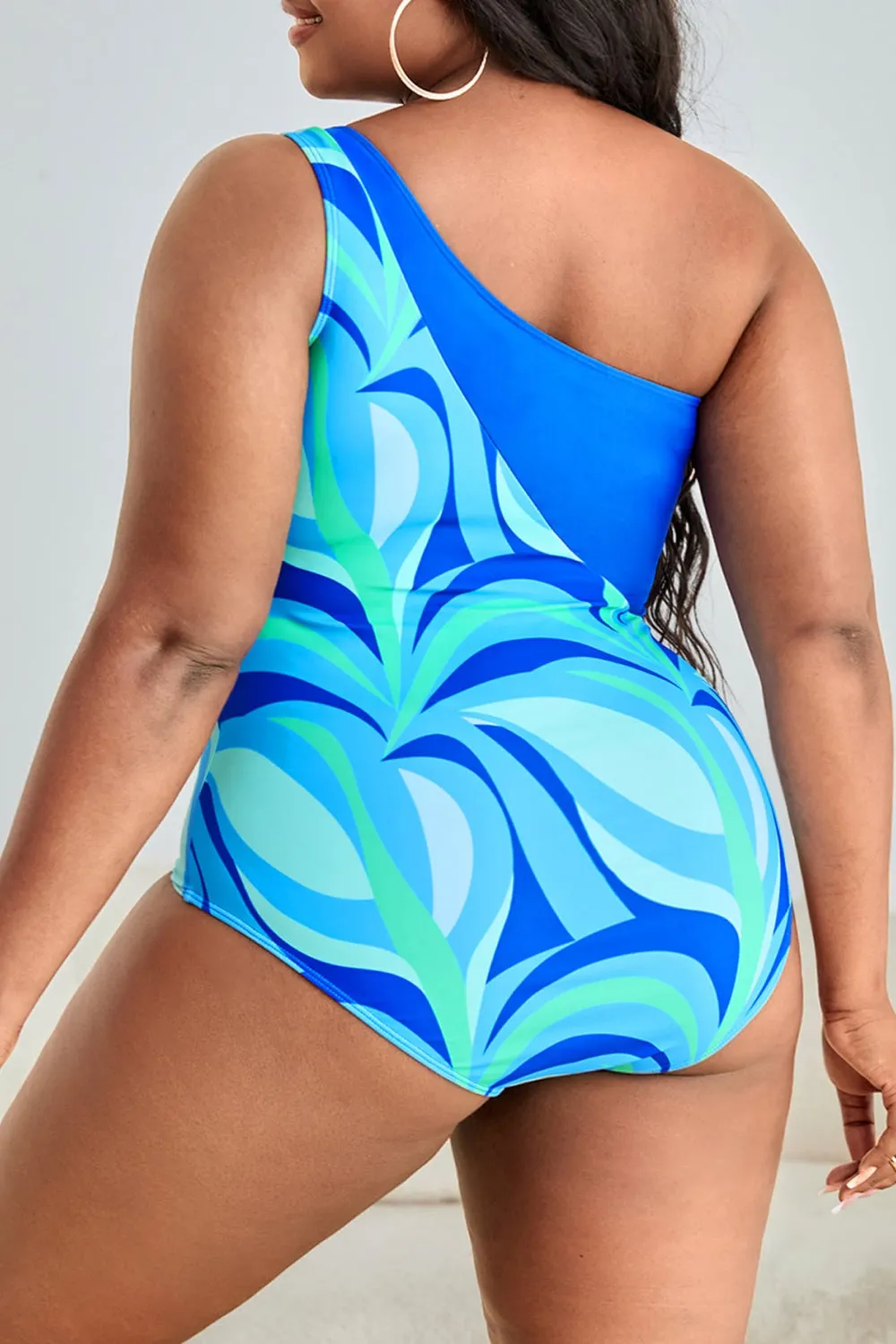 Groovy Baby Plus Size Printed Ring Detail One-Shoulder One-Piece Swimsuit