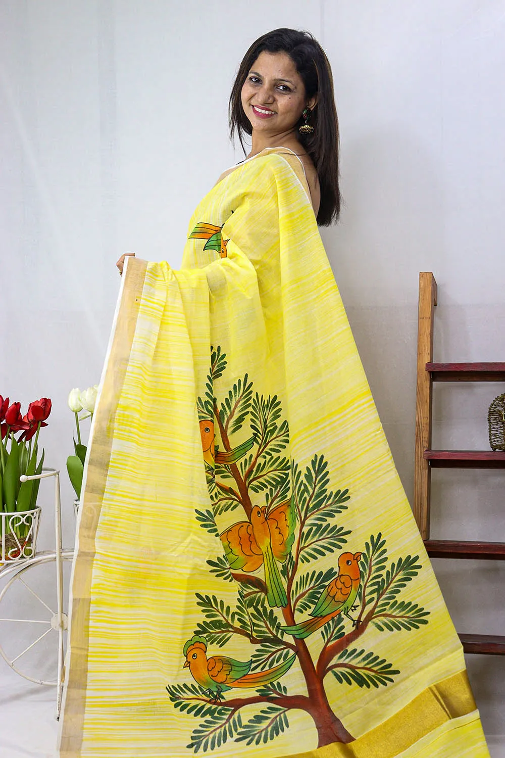 Hand-painted Kerala cotton saree - Vibrant yellow, pure elegance