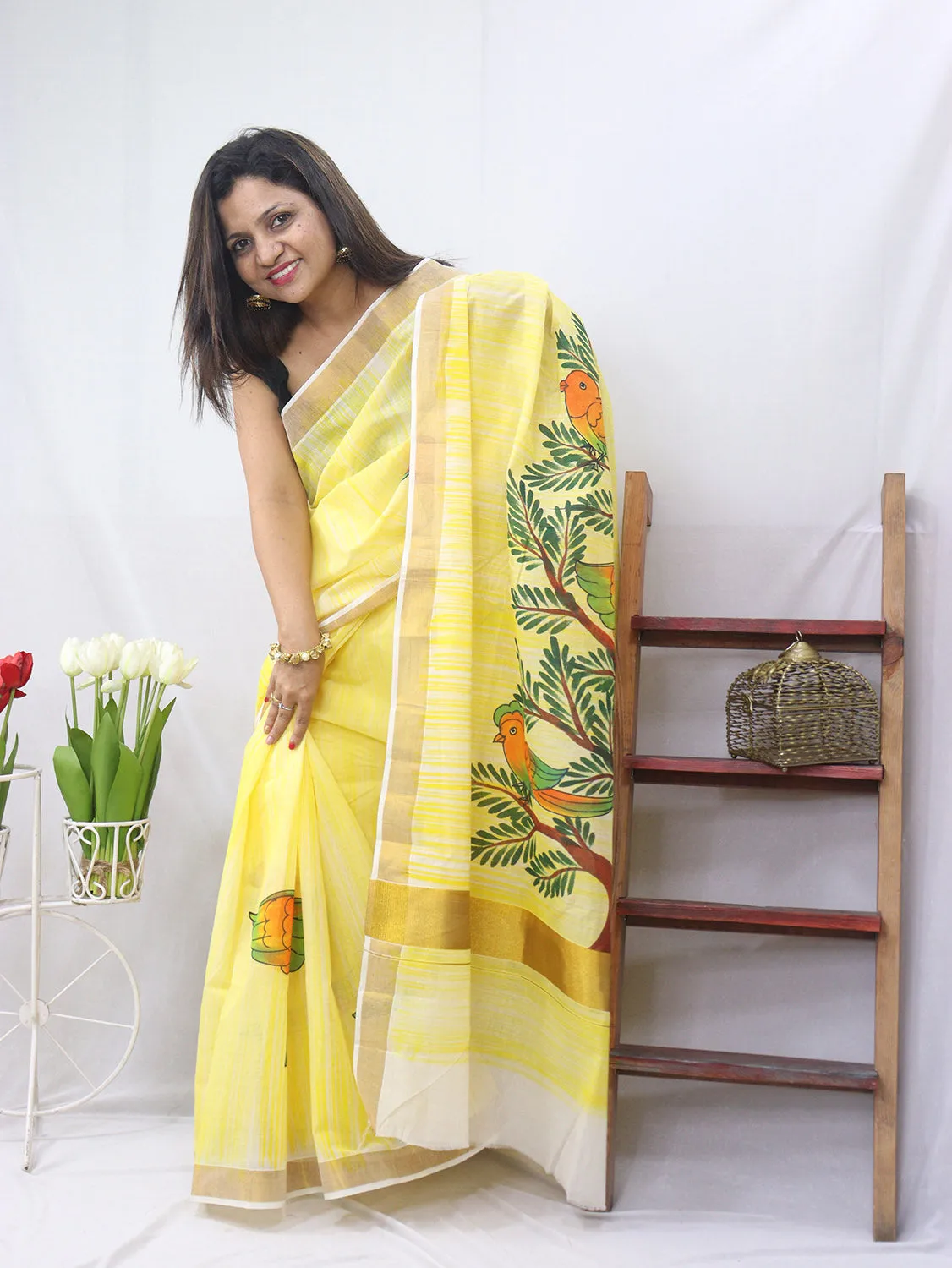 Hand-painted Kerala cotton saree - Vibrant yellow, pure elegance