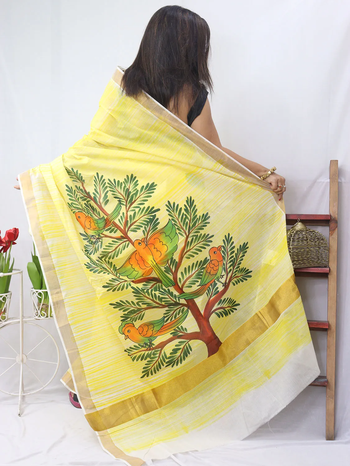Hand-painted Kerala cotton saree - Vibrant yellow, pure elegance
